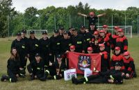 Zdjęcie: Strażacy ochotnicy uczestniczący w zawodach strażackich